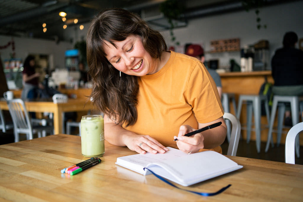 Core Values Journal 2022 Woman Writing on Her Journal 21