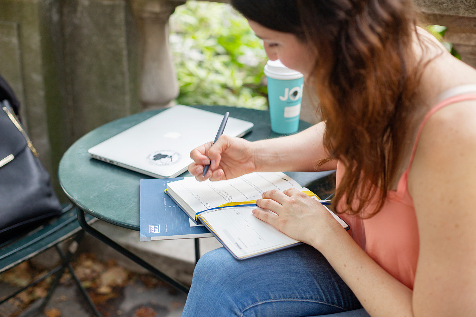 Self Journal 2022 - Woman Writing on Her Journal 1.jpg